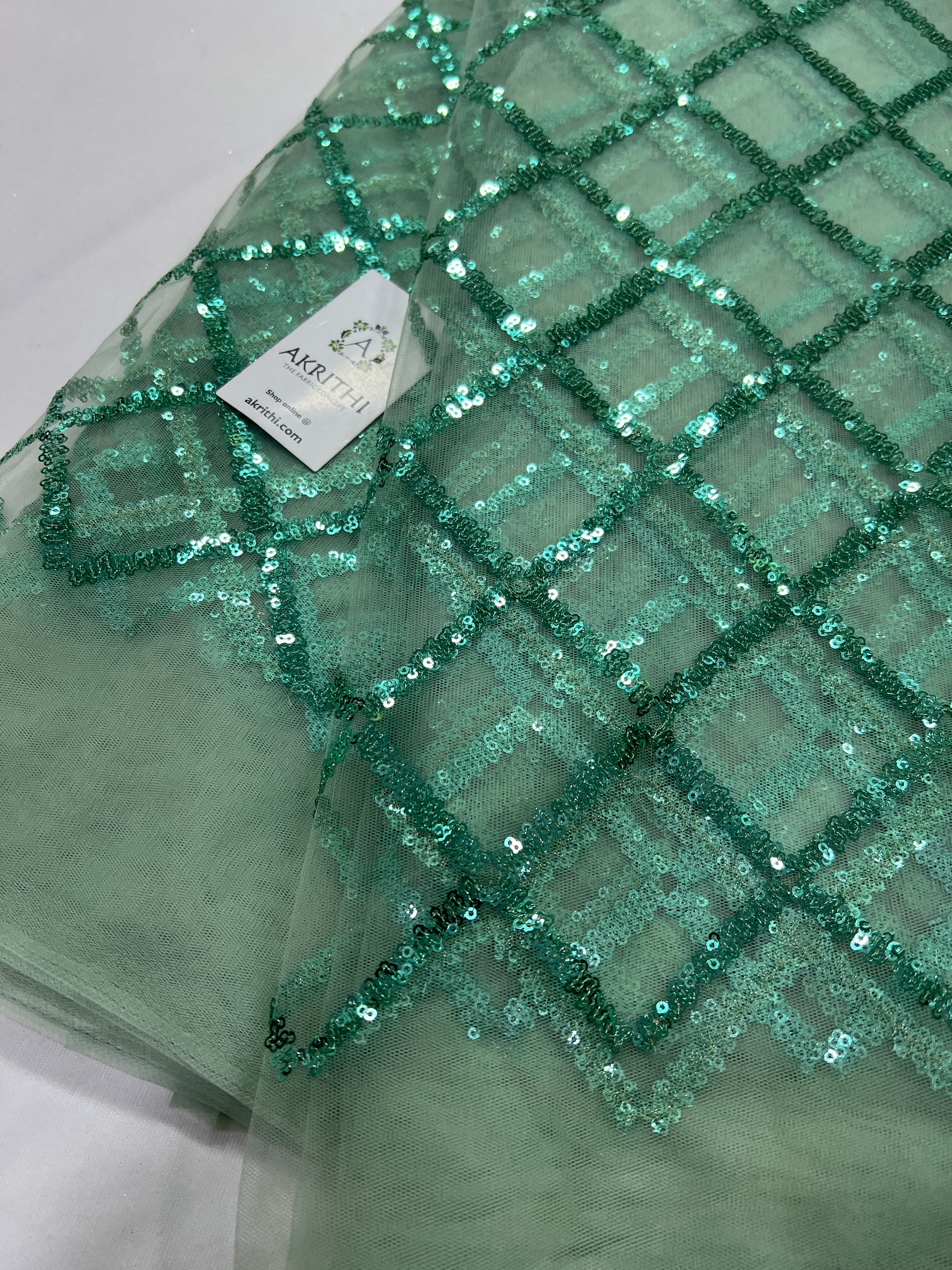 Embroidery on net fabric
