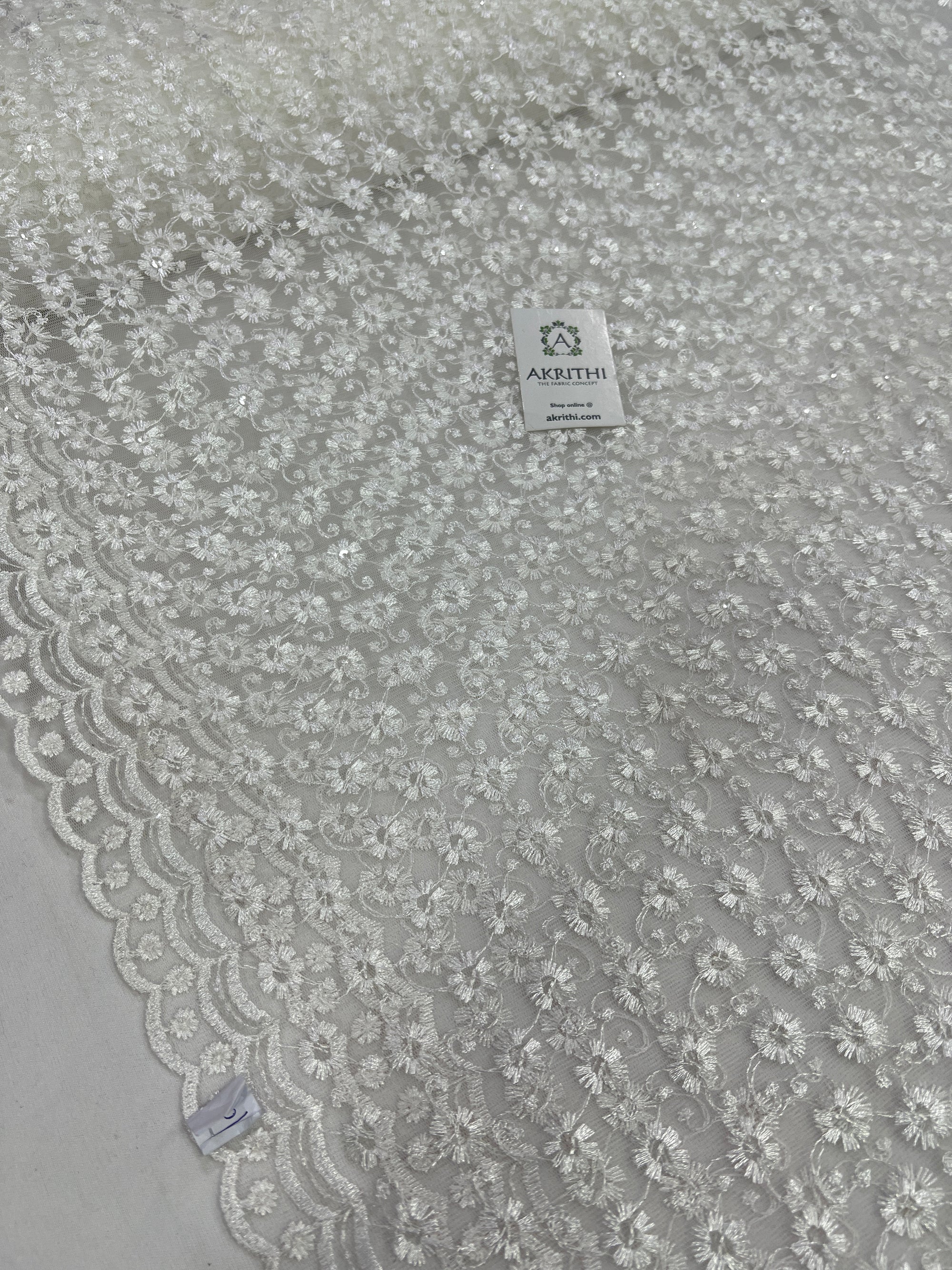 Embroidery on net fabric