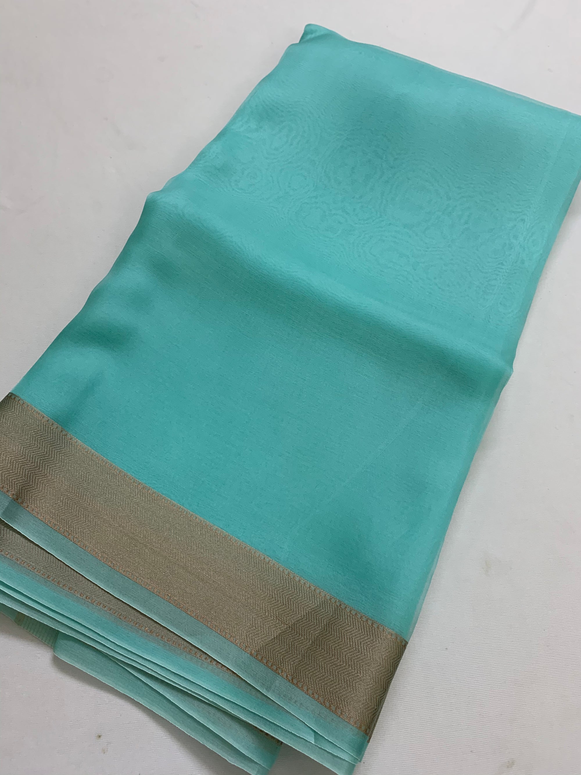 Pure silk organza saree with zari border