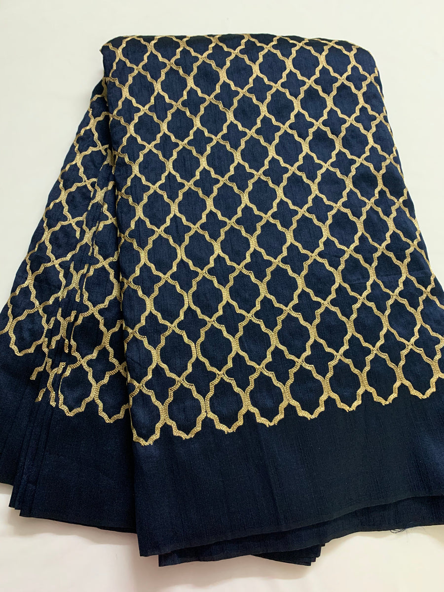 Embroidery on navy blue raw silk fabric