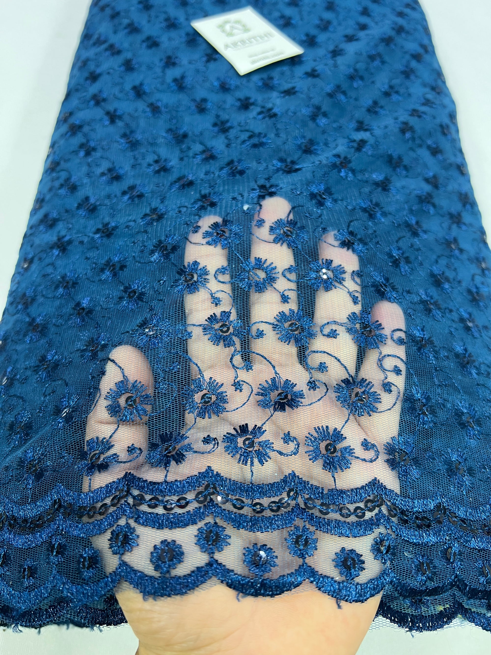 Embroidery on net fabric