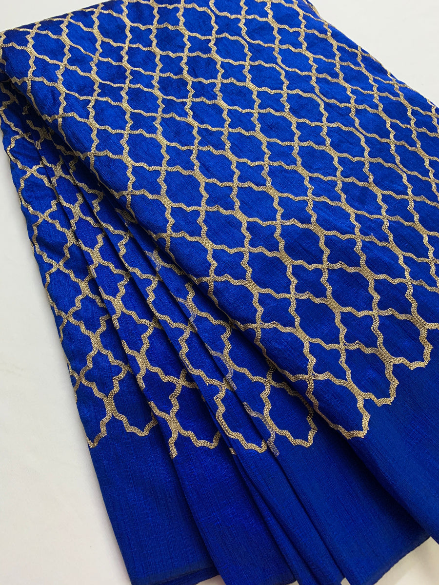 Embroidery on royal blue raw silk fabric
