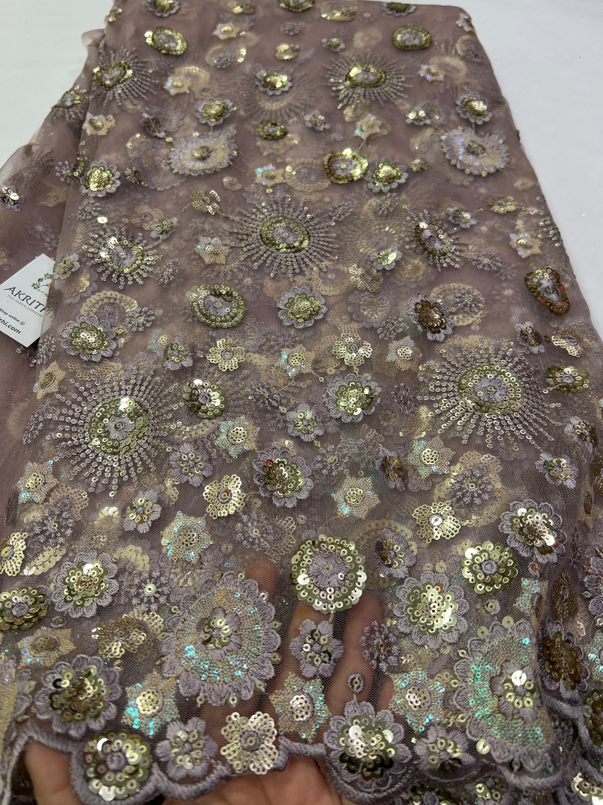 Embroidery on net fabric