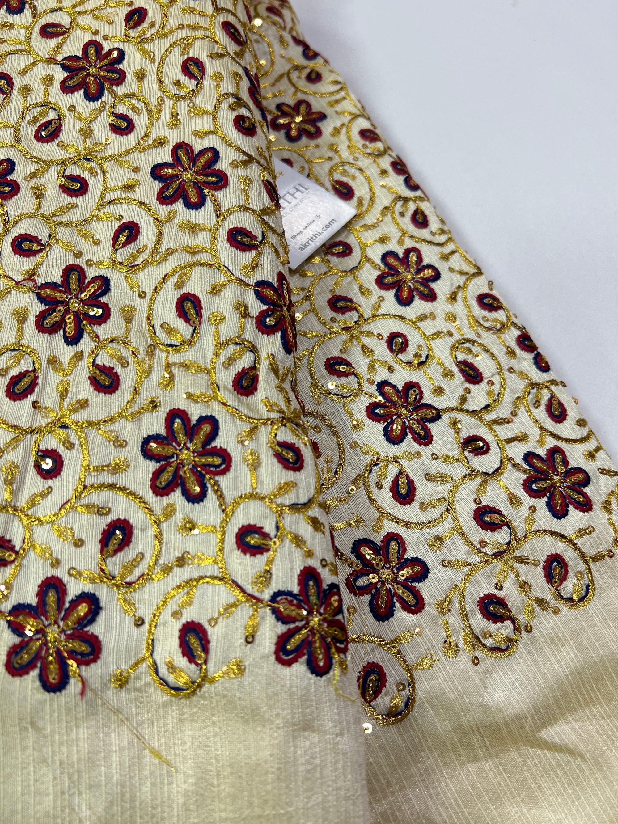 Embroidery on raw silk fabric