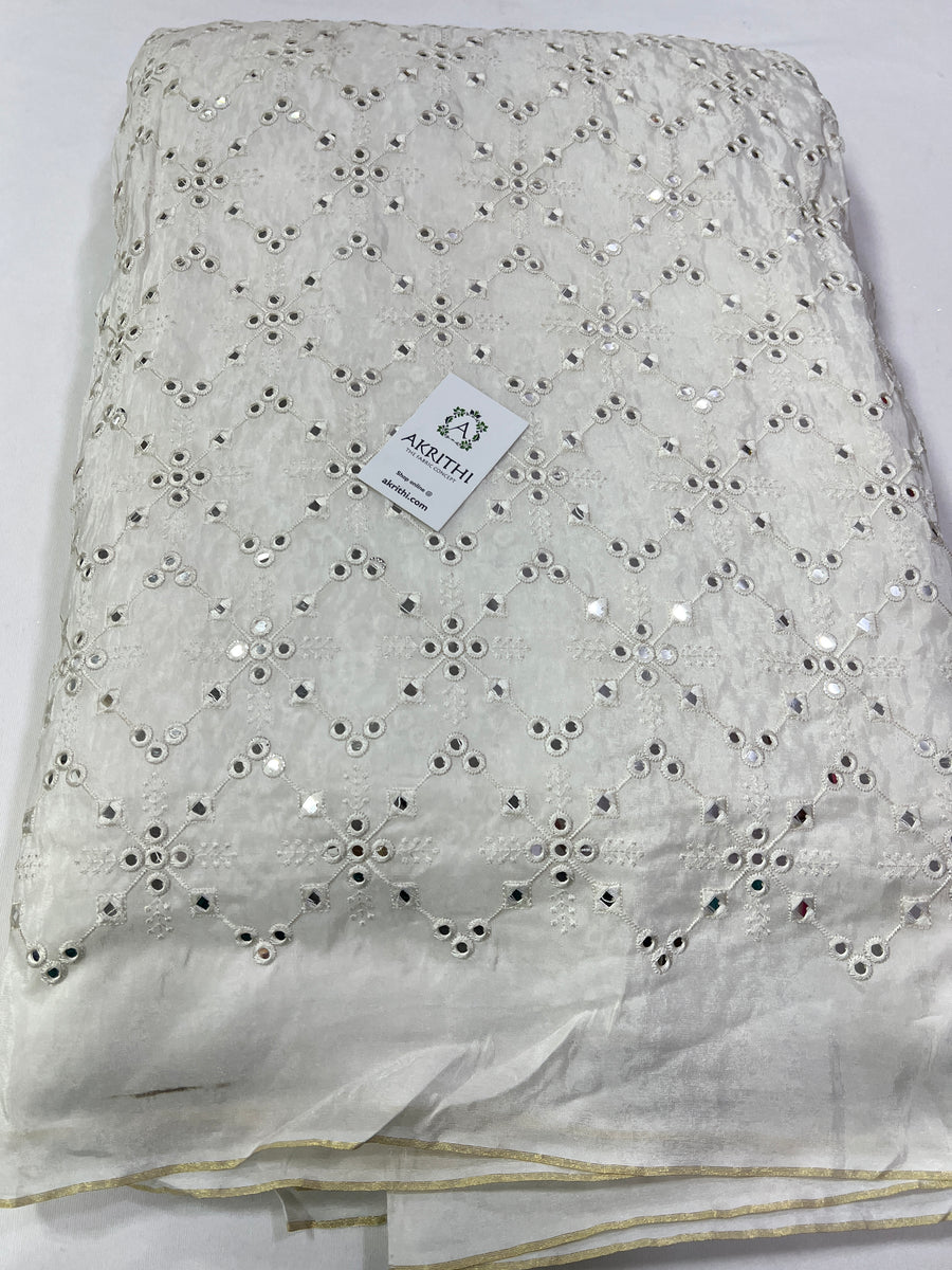 Mirror Embroidery on Half white semi silk fabric