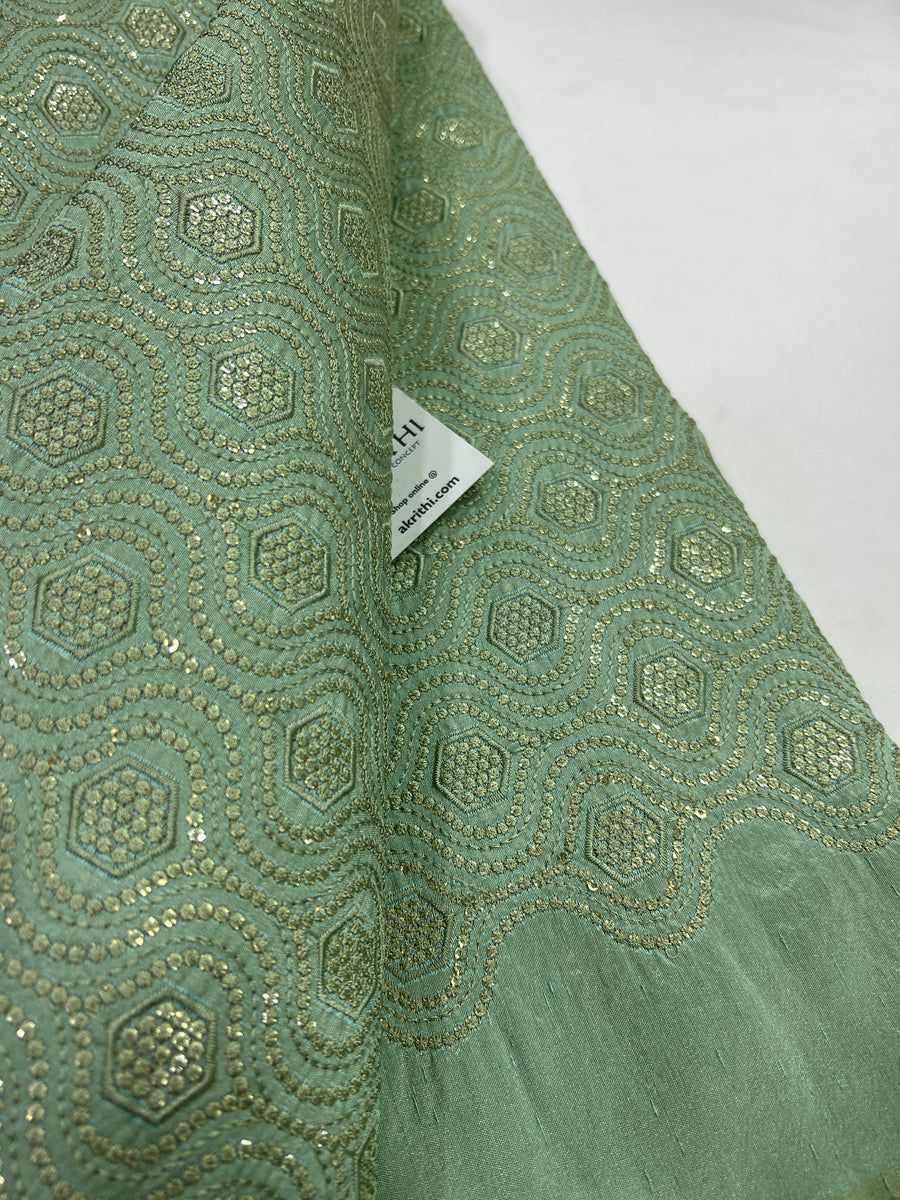 Heavy Embroidery on sea green raw silk fabric