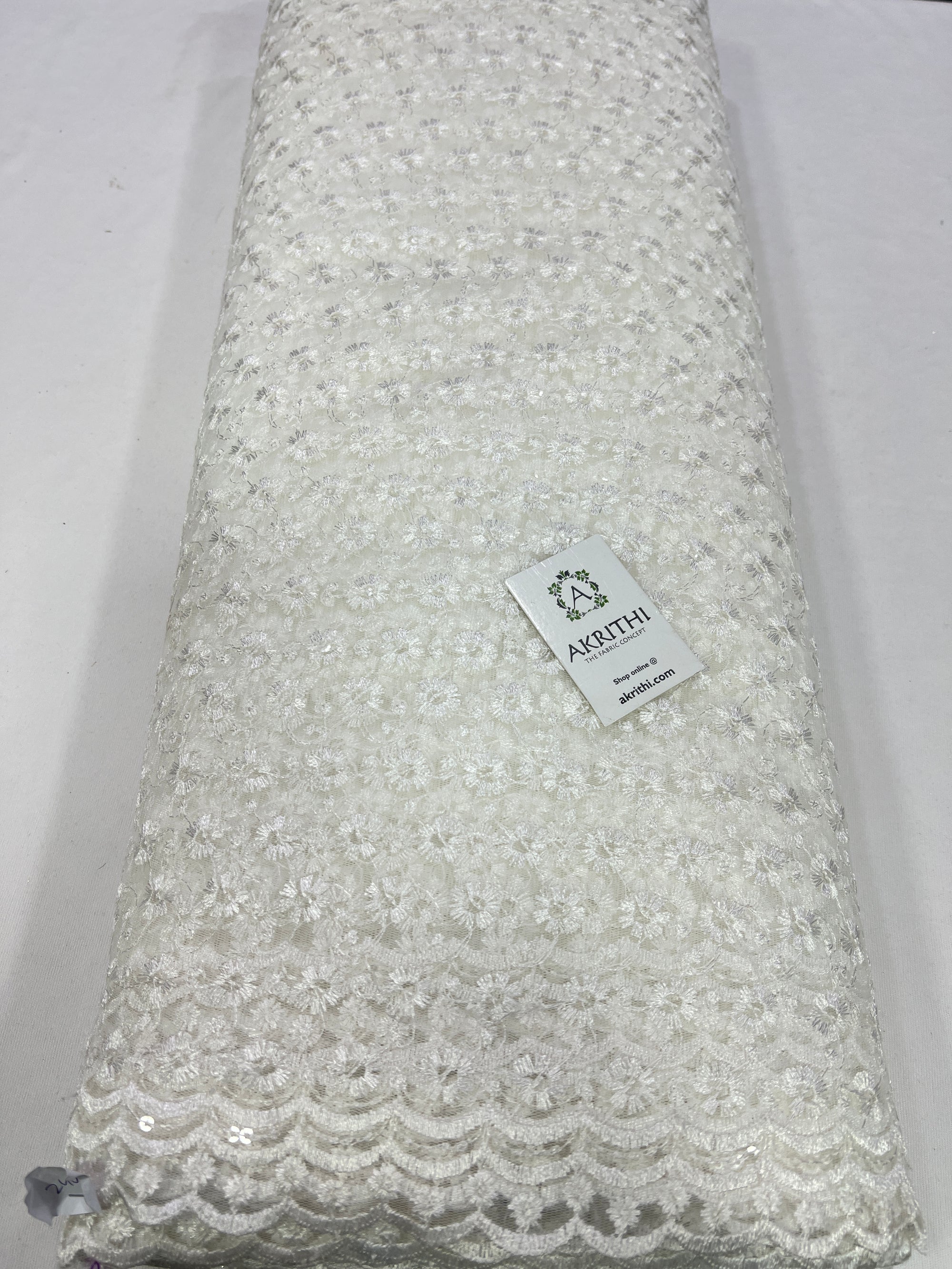 Embroidery on net fabric