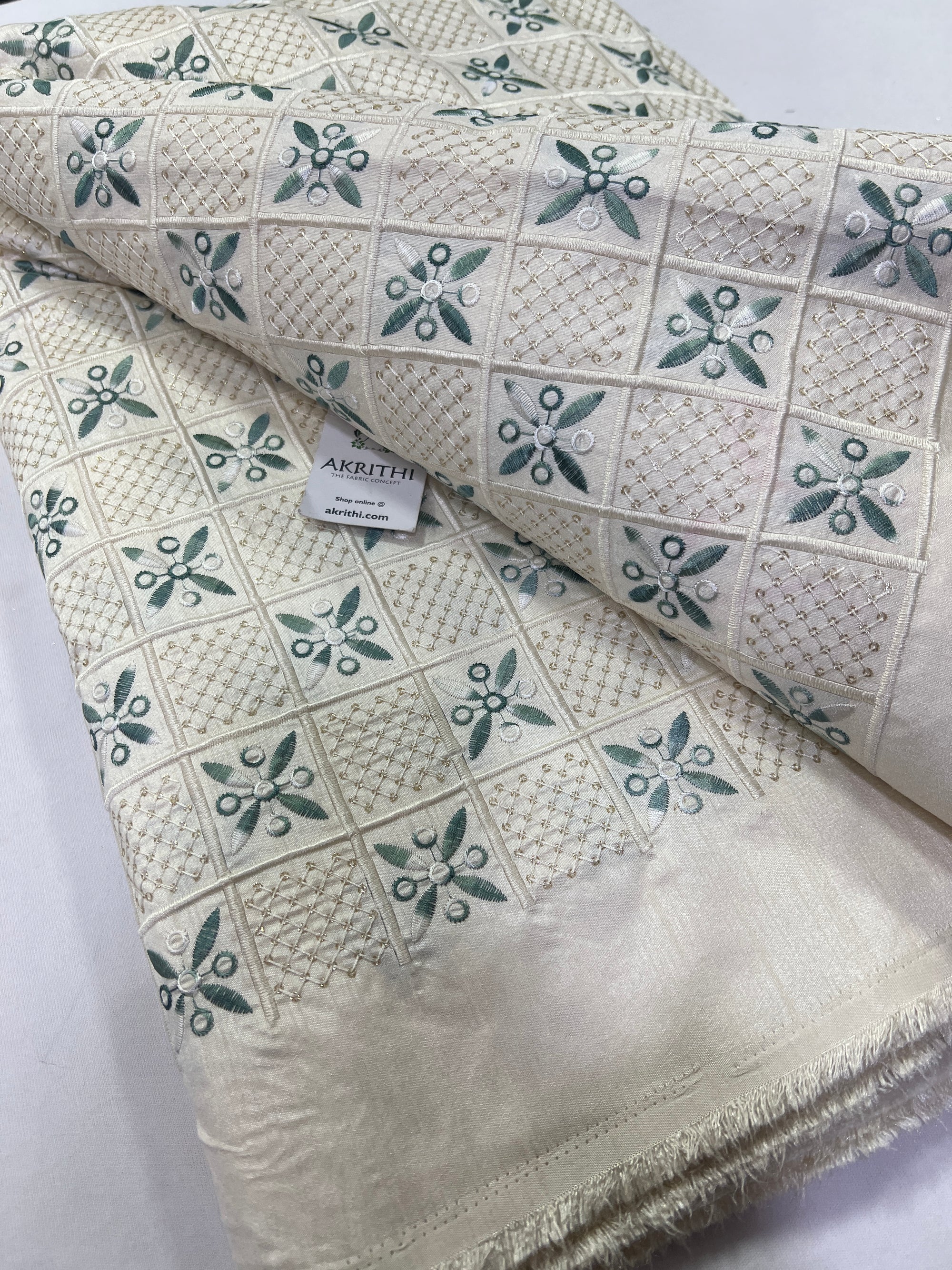 Embroidery on raw silk fabric