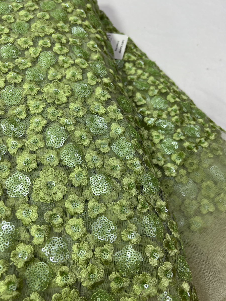 Green heavy Embroidery on Half white net fabric