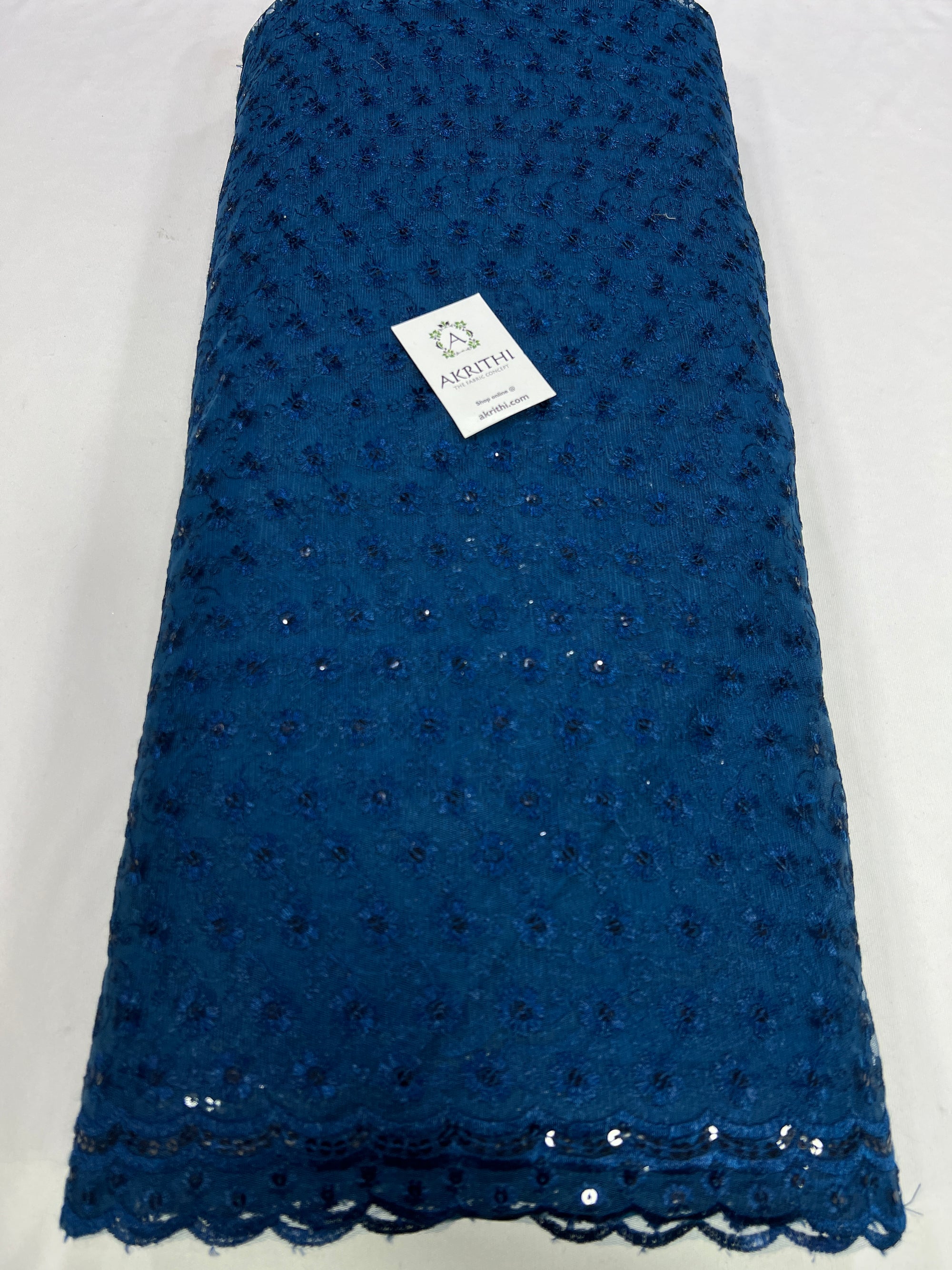Embroidery on net fabric