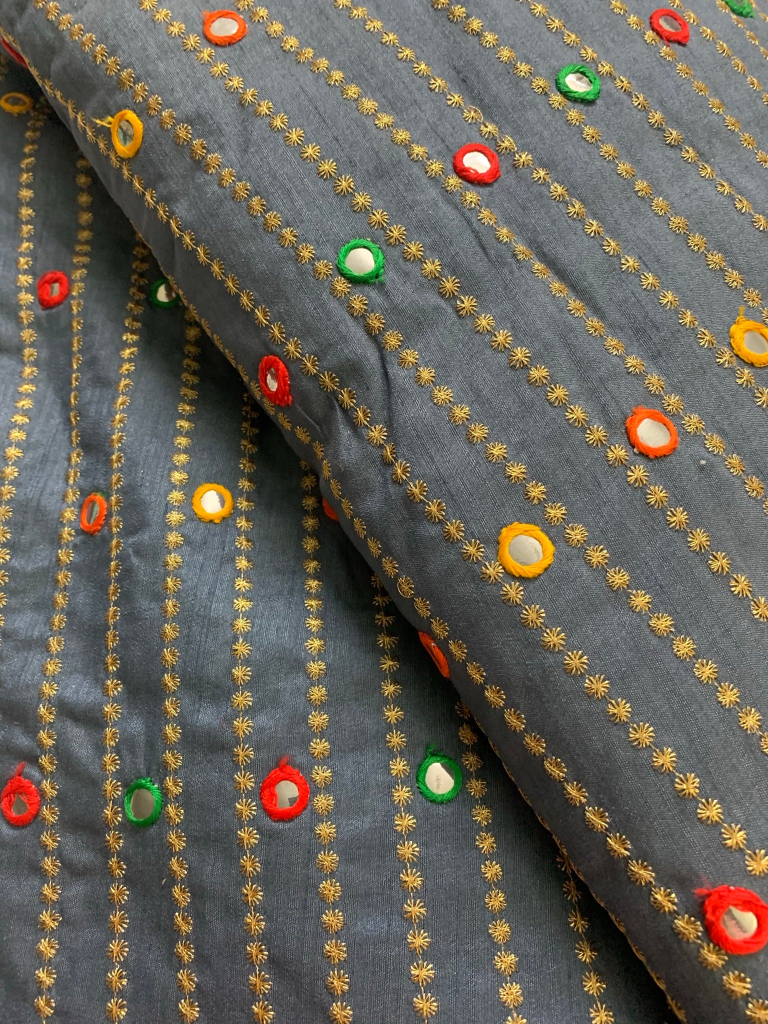 Embroidery on raw silk fabric