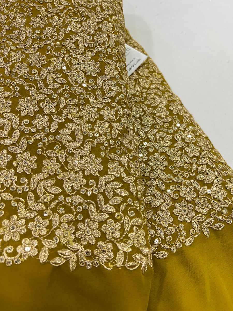 Embroidery on mustard yellow georgette fabric