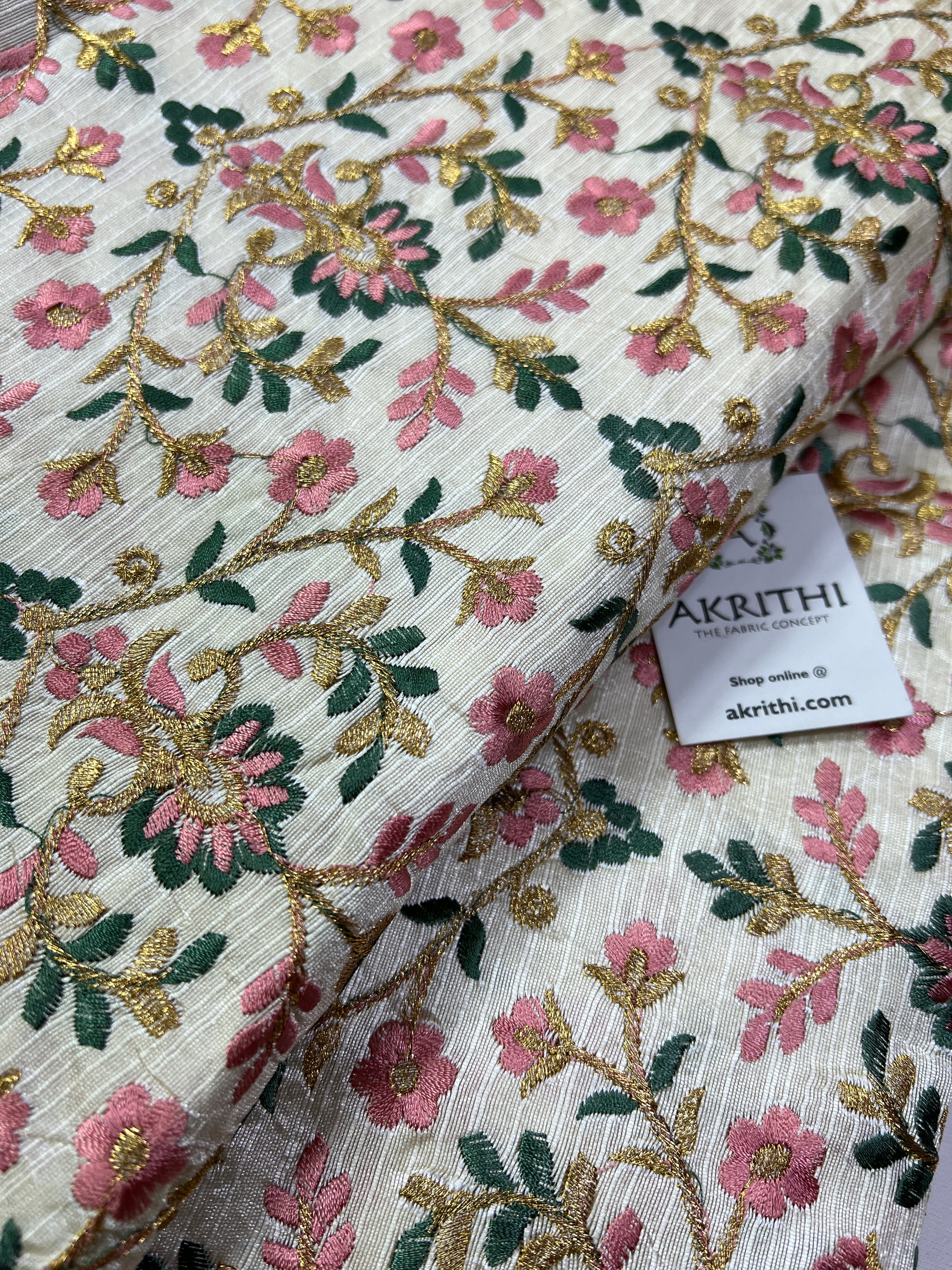 Embroidery on raw silk fabric