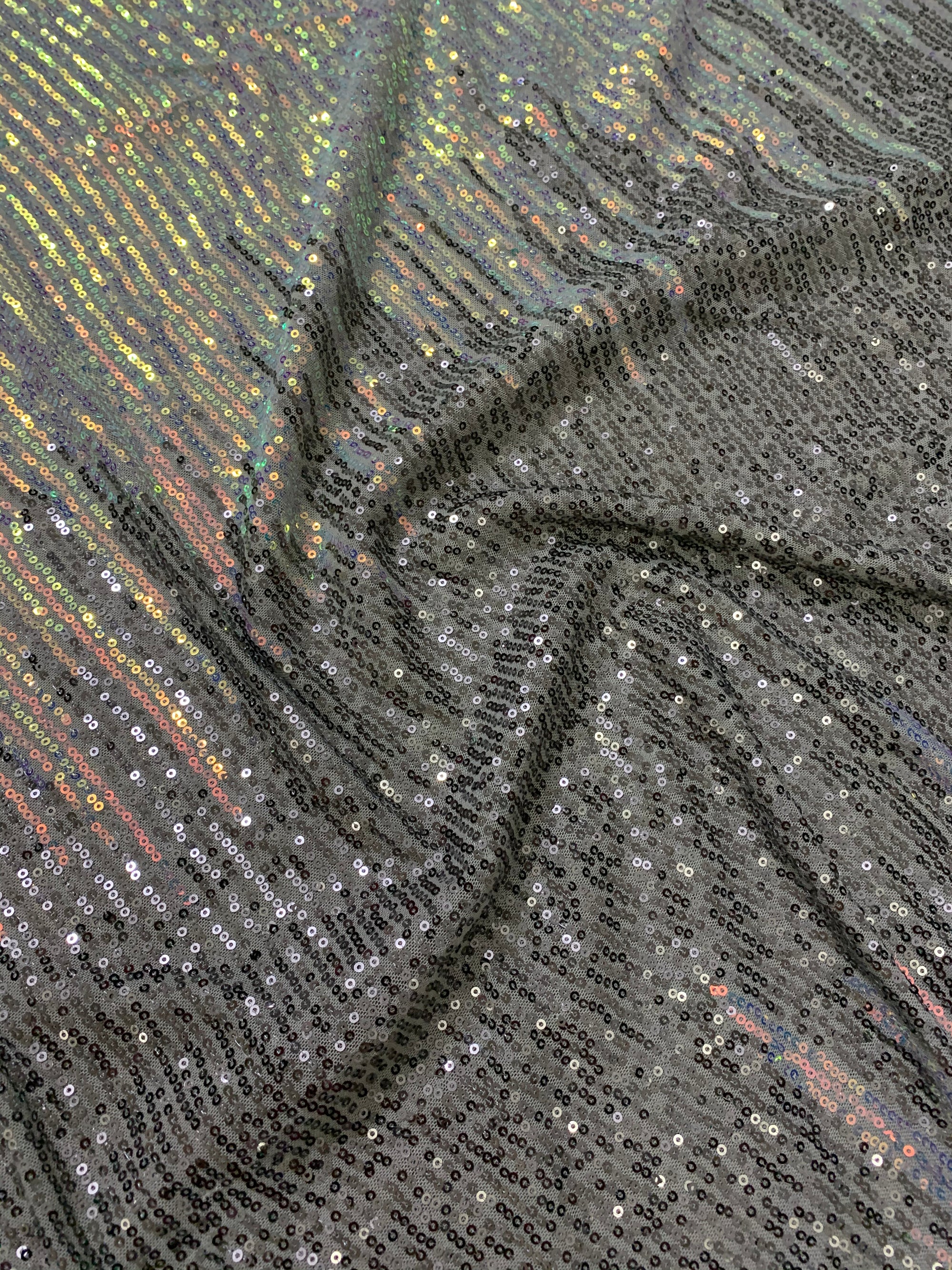 Sequins on micro Lycra net fabric