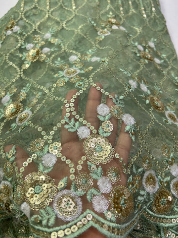 Embroidery on net fabric