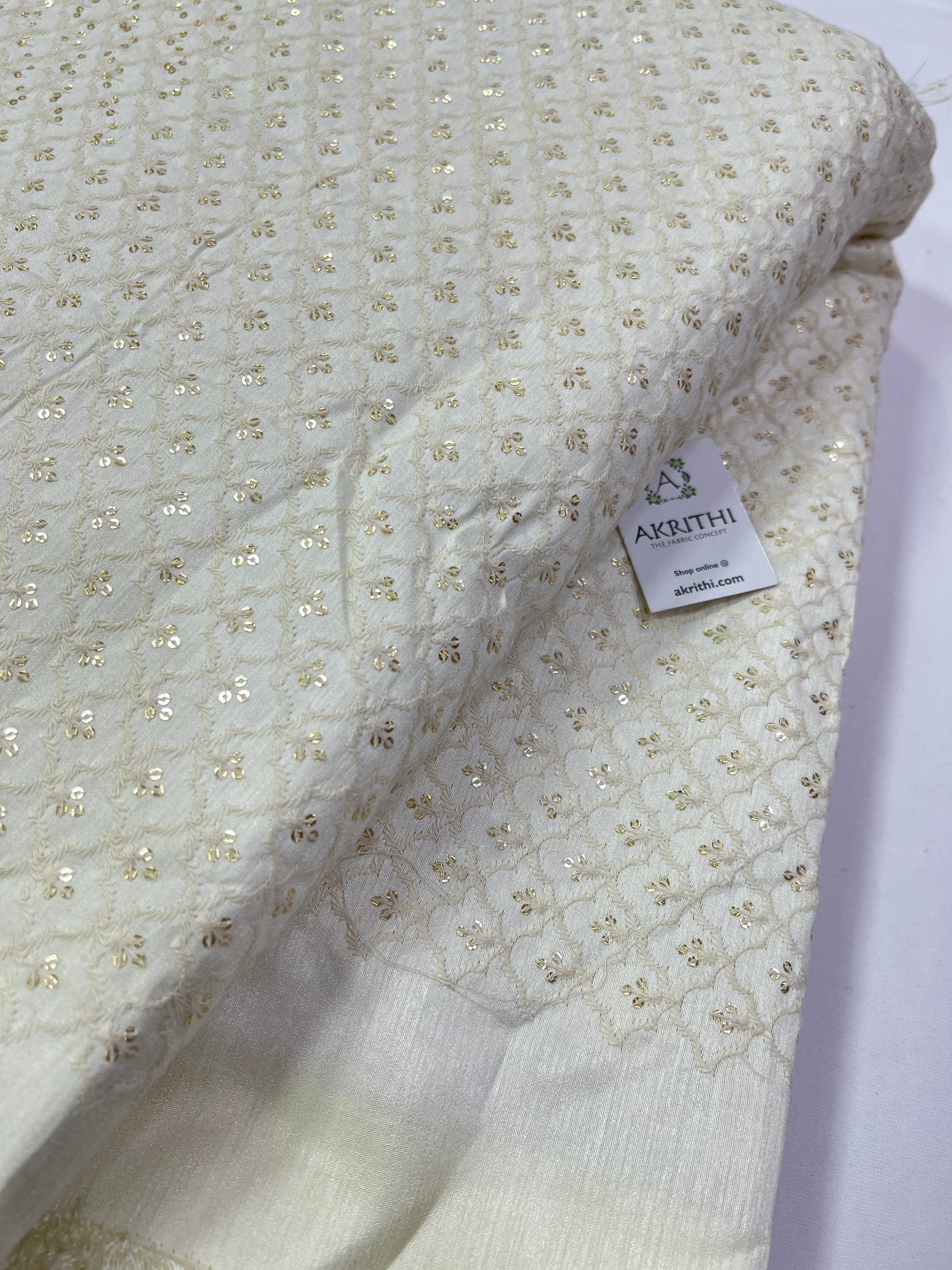 Embroidery on raw silk fabric