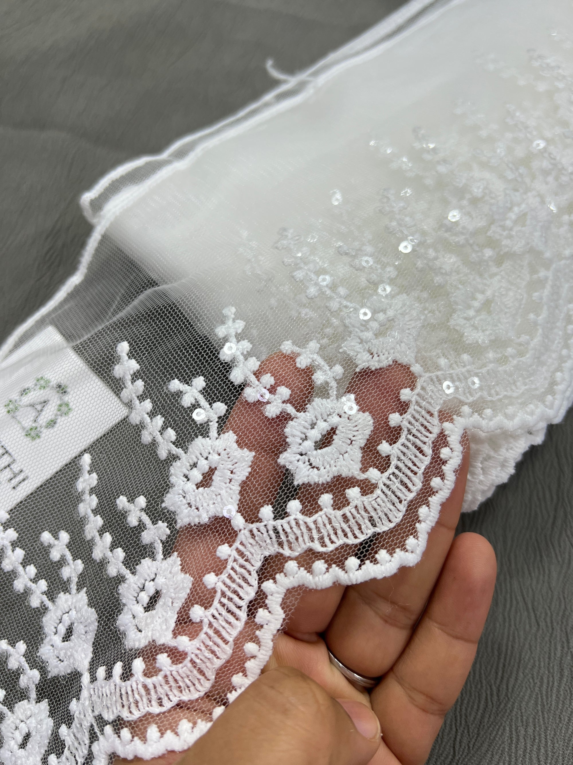 Embroidered white net lace 9 metres roll