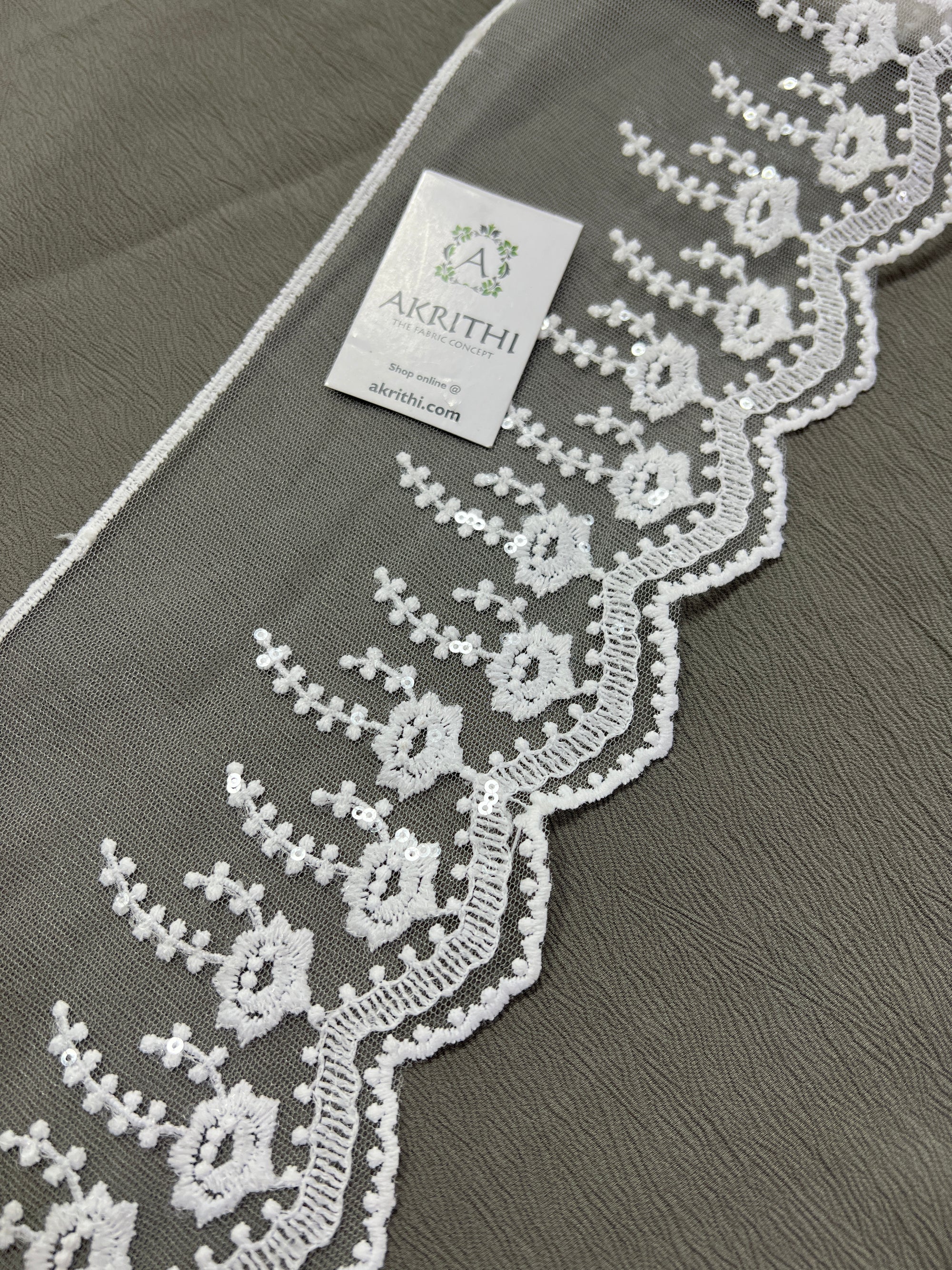 Embroidered white net lace 9 metres roll