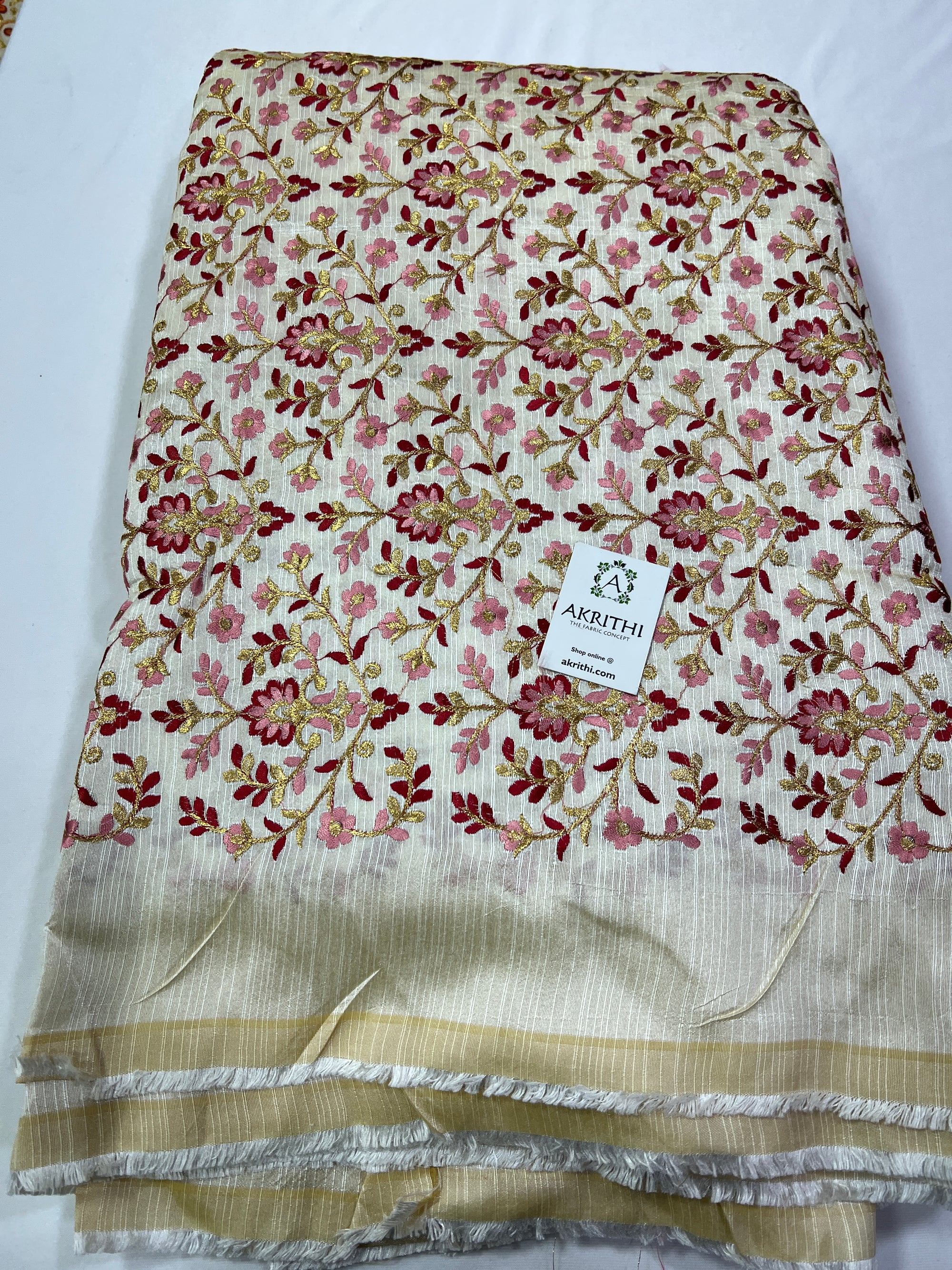 Embroidery on raw silk fabric