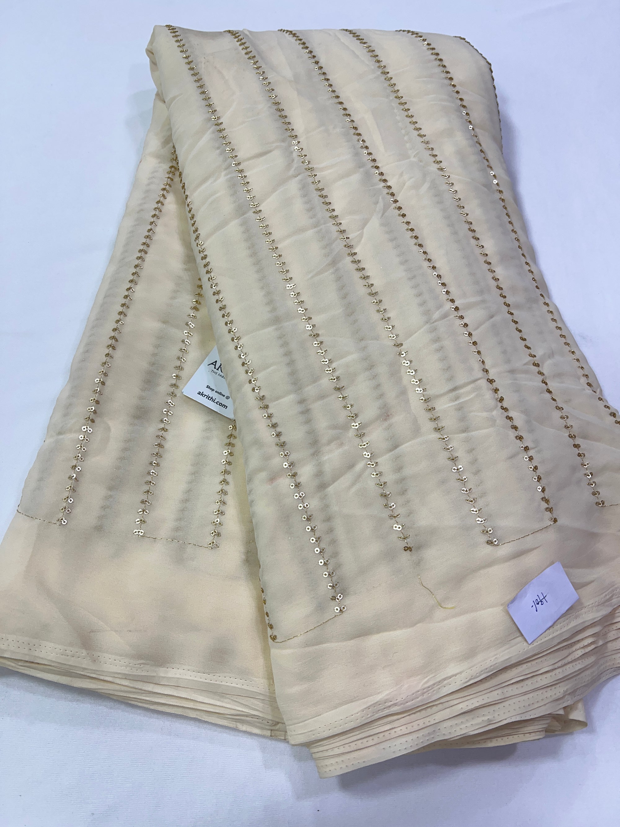 Embroidery on Sandal colour Georgette fabric