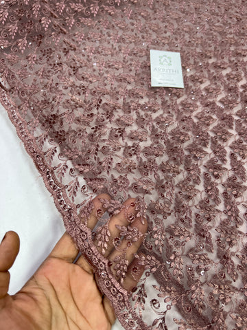 Embroidery on net fabric