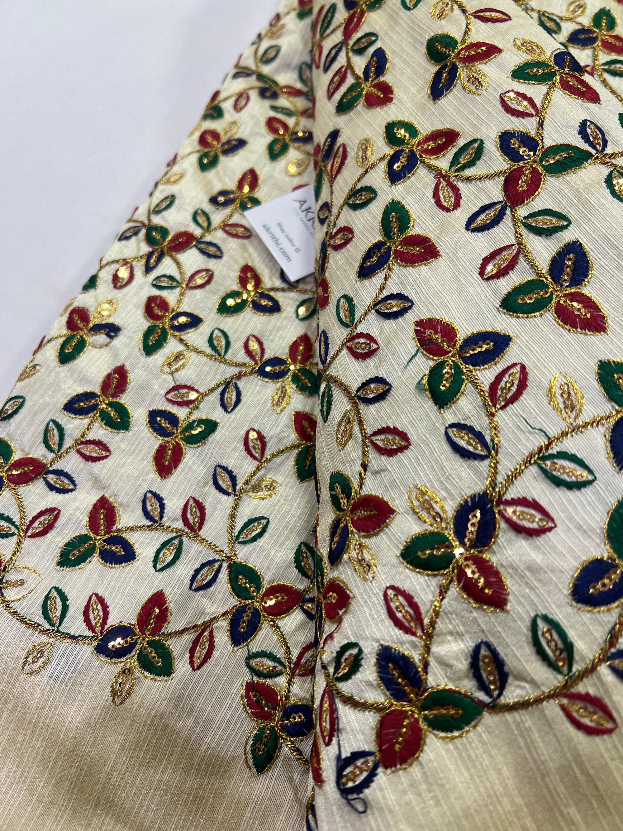 Embroidery on raw silk fabric