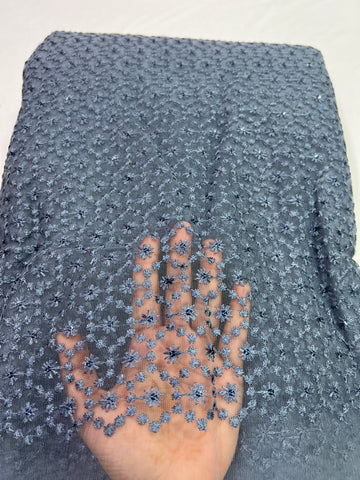 Embroidery on net fabric