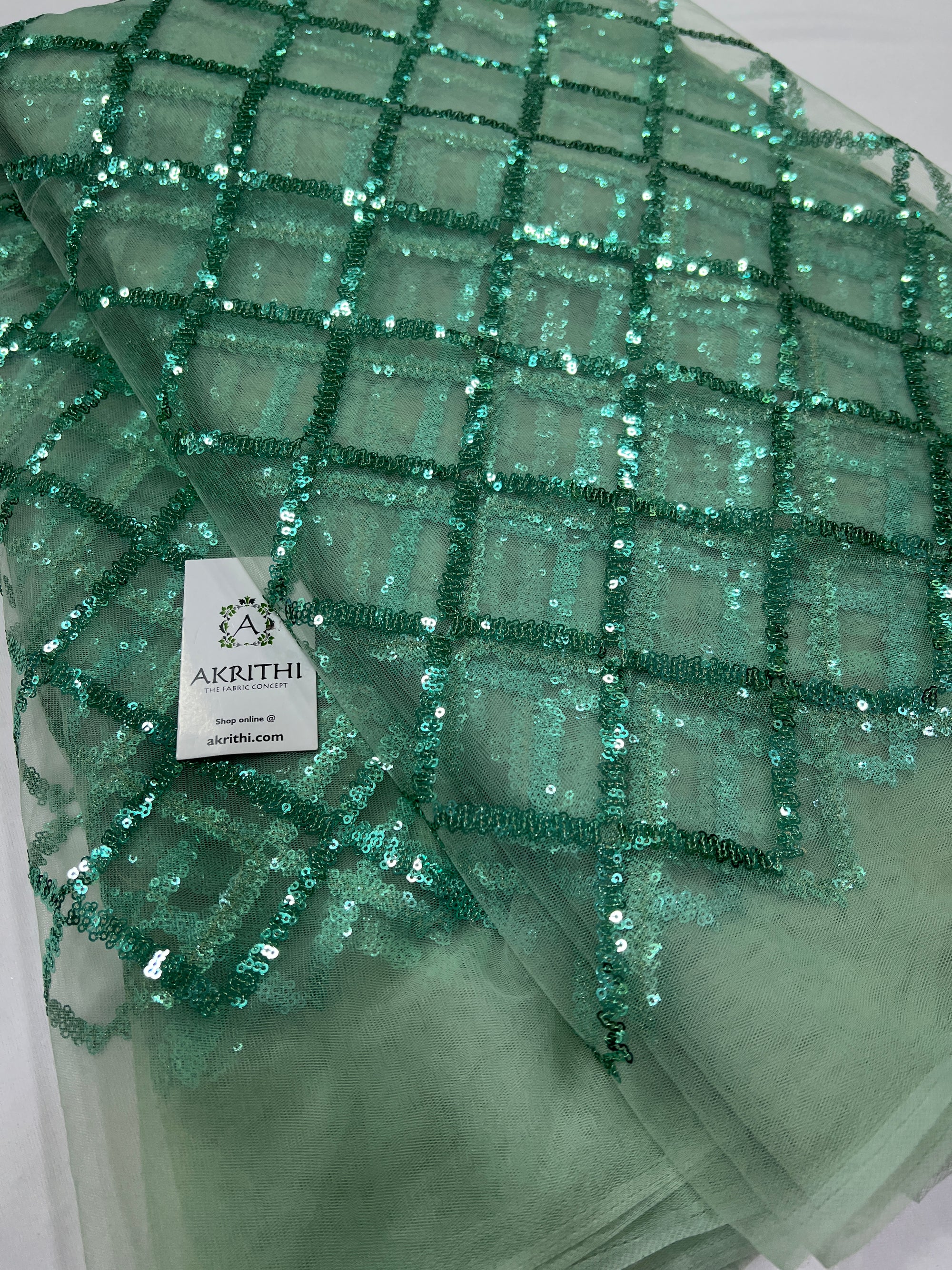 Embroidery on net fabric