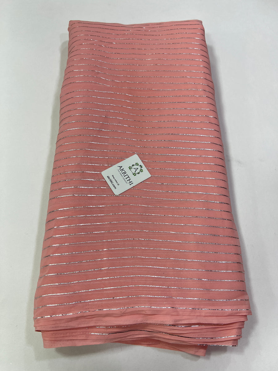 Foil printed pinkish peach georgette fabric