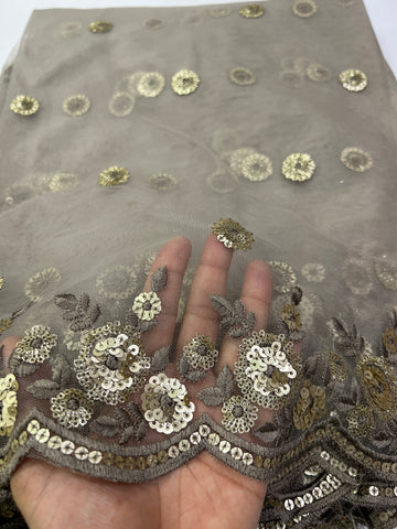 Embroidery on net fabric