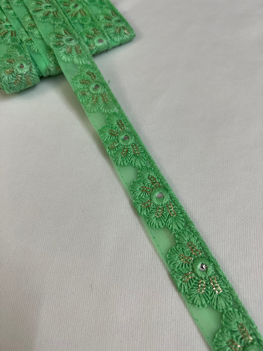 Embroidered lace 9 metres roll green